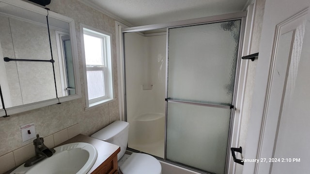 2945 County Road 4 SW Unit 118, Cokato, MN 55321 - bathroom with a shower with shower door, healthy amount of natural light, toilet, and decorative backsplash