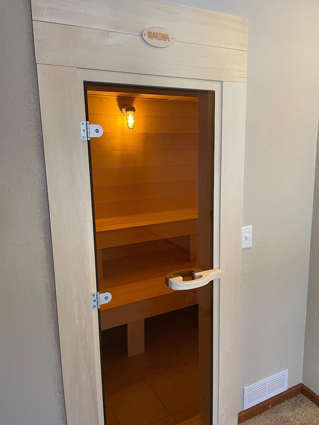 view of sauna with baseboards