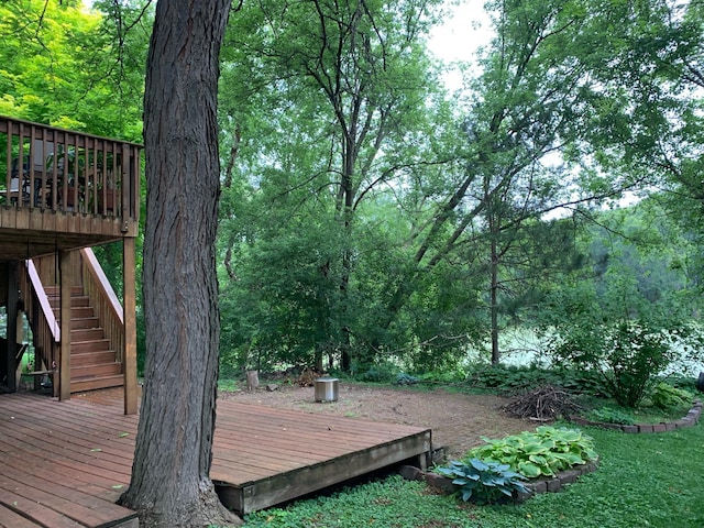 wooden deck featuring stairs