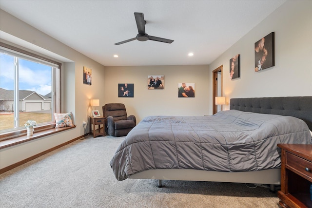 carpeted bedroom featuring ceiling fan, baseboards, and recessed lighting