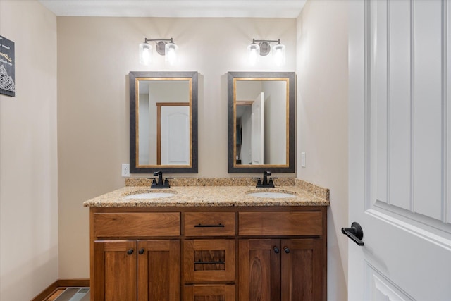 bathroom with double vanity and a sink