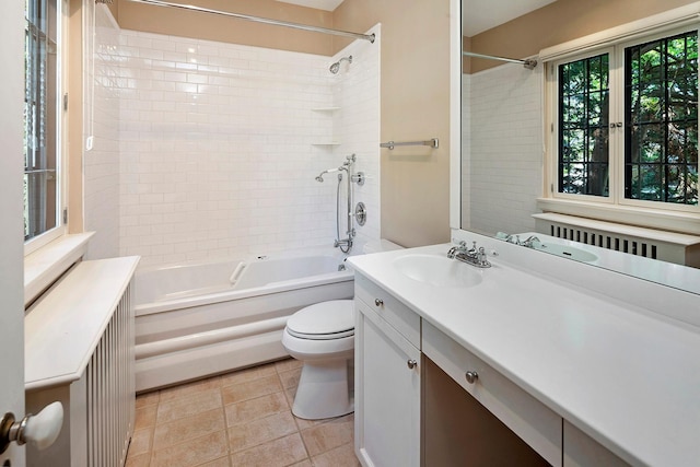 bathroom with shower / washtub combination, vanity, toilet, and tile patterned floors