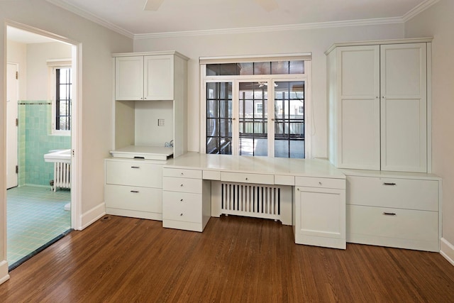 1769 Dupont Ave S Unit 1, Minneapolis, MN 55403 - unfurnished office featuring radiator heating unit, built in study area, dark wood-style floors, ornamental molding, and baseboards