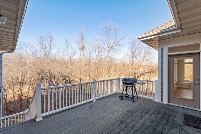 wooden deck with grilling area