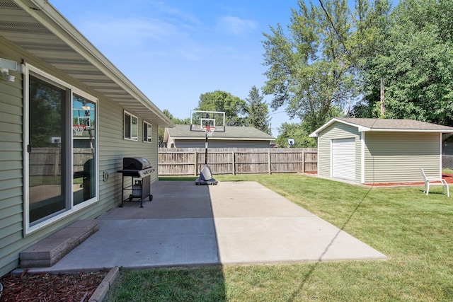 view of patio / terrace featuring an outdoor structure, fence, and a grill