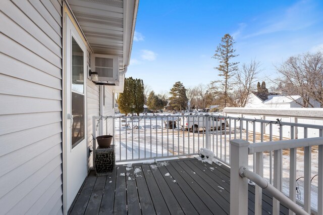 view of snow covered deck