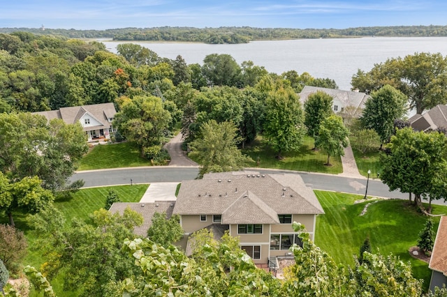 drone / aerial view with a water view