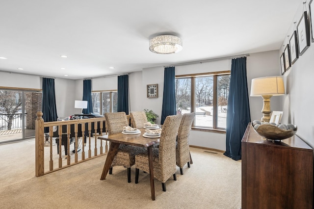 dining space featuring recessed lighting, visible vents, baseboards, and light colored carpet