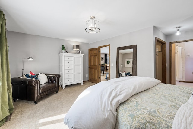 bedroom with light carpet and a chandelier