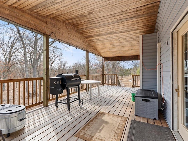wooden deck with grilling area