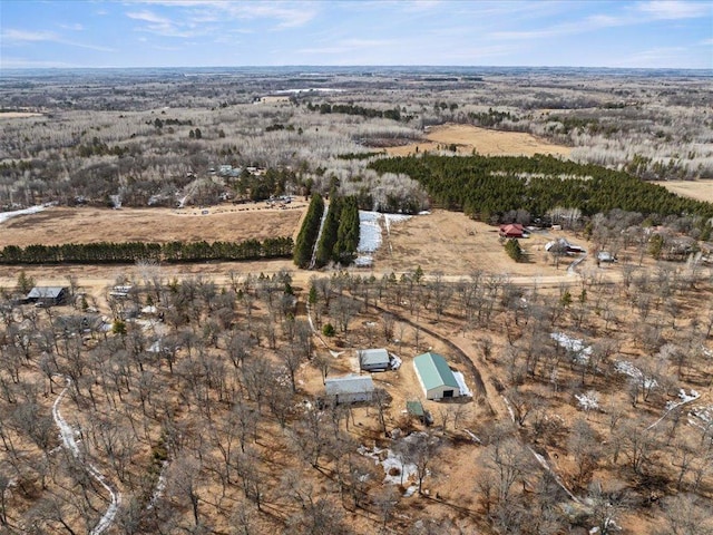birds eye view of property with a rural view