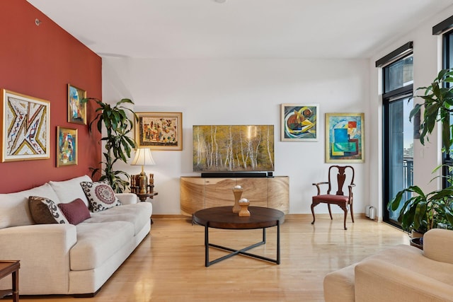 living area with light wood-style floors