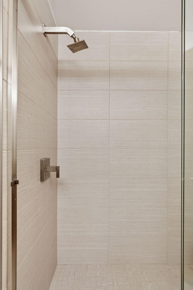 bathroom featuring a shower stall