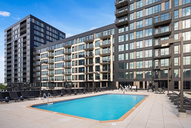 community pool with a patio