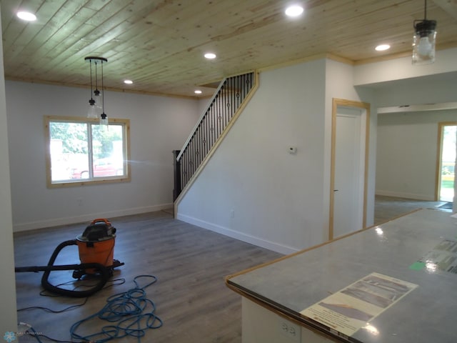 212 May Ave, Page, ND 58064 - unfurnished living room with wood ceiling, recessed lighting, baseboards, wood finished floors, and stairway