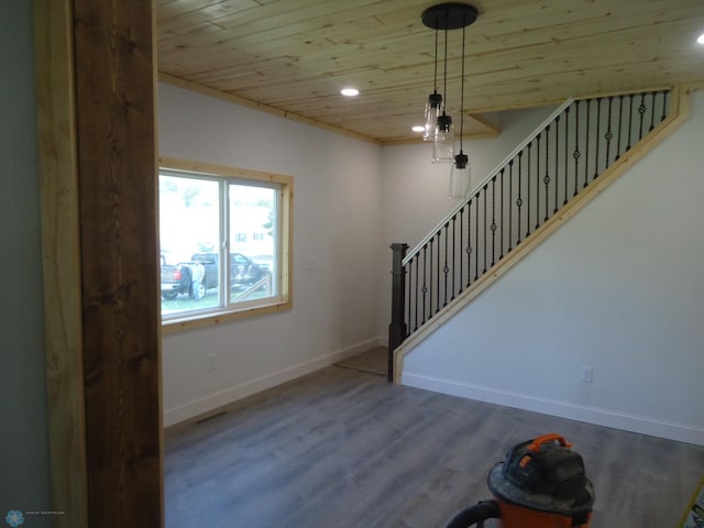 212 May Ave, Page, ND 58064 - foyer entrance featuring wood ceiling, stairs, baseboards, wood finished floors, and recessed lighting