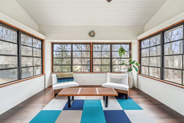 unfurnished sunroom with vaulted ceiling