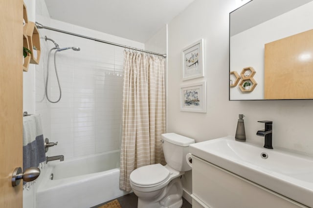 bathroom with shower / tub combo, vanity, and toilet