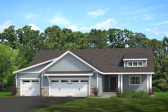 view of front of house featuring aphalt driveway, a front lawn, a shingled roof, and a garage