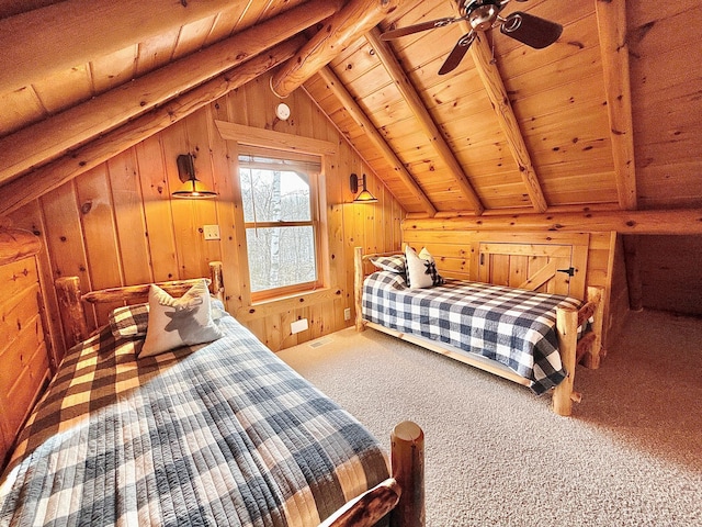 carpeted bedroom featuring wood ceiling and wood walls