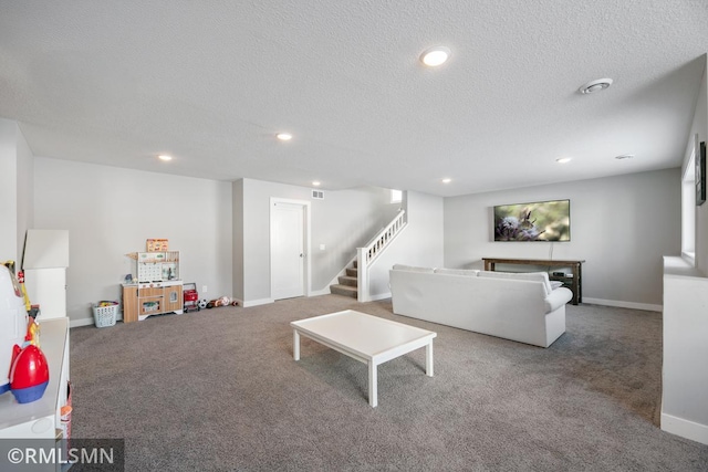 carpeted living area featuring baseboards, stairway, a textured ceiling, and recessed lighting