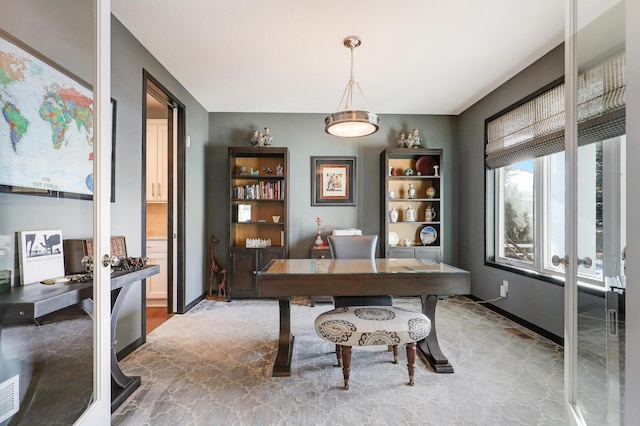 office space featuring french doors and baseboards