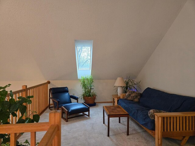 living area featuring carpet floors and lofted ceiling