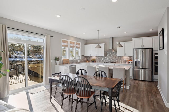 dining room with recessed lighting, dark wood-style flooring, visible vents, and baseboards