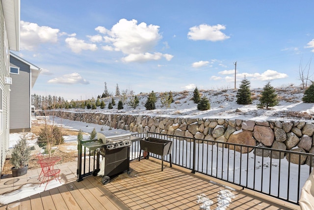 wooden deck featuring grilling area