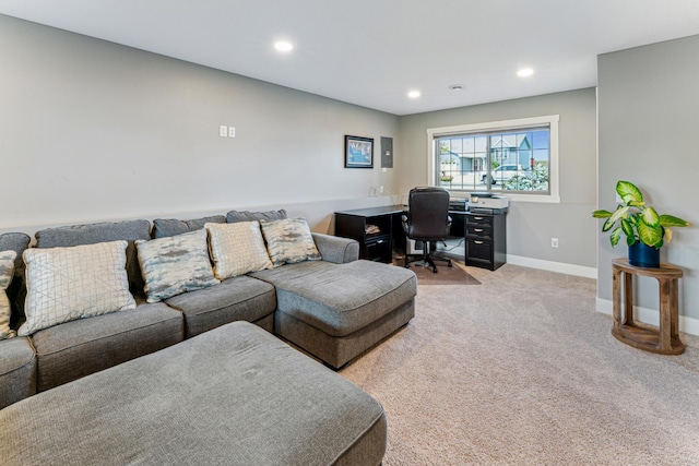 living room with light carpet, baseboards, and recessed lighting