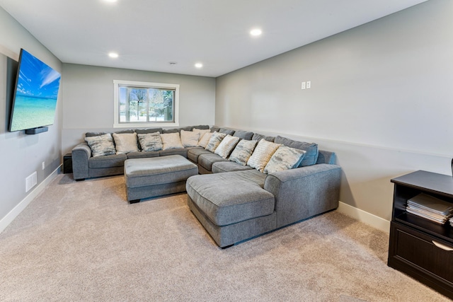 living room featuring recessed lighting, baseboards, visible vents, and light colored carpet