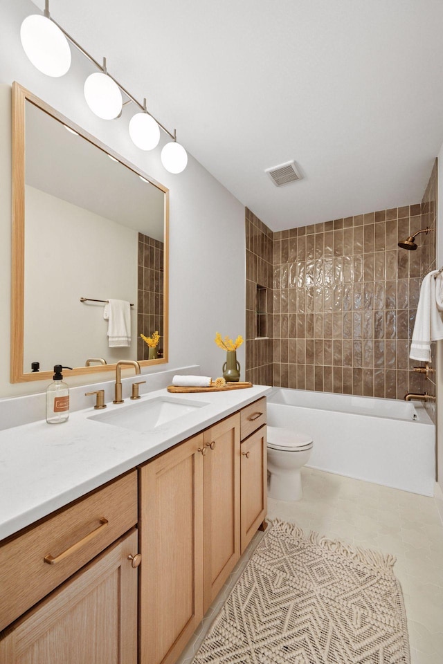 full bath with shower / bath combination, toilet, and vanity