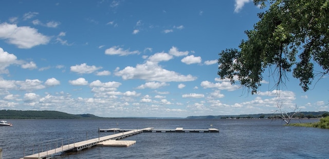 dock area with a water and mountain view