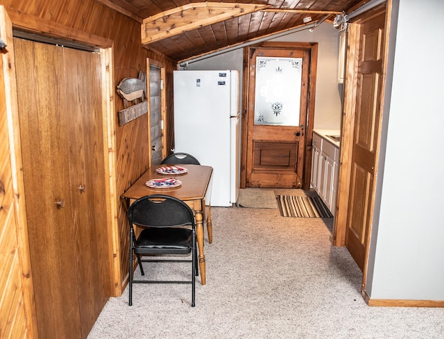 1702 Lakeshore Dr Unit 8, Lake City, MN 55041 - doorway to outside with wooden walls, wood ceiling, carpet floors, and vaulted ceiling