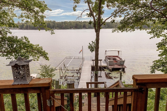 property view of water featuring a boat dock