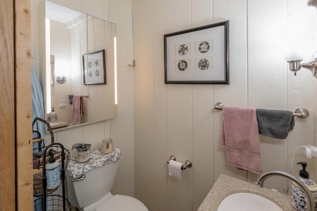 bathroom with a sink and toilet