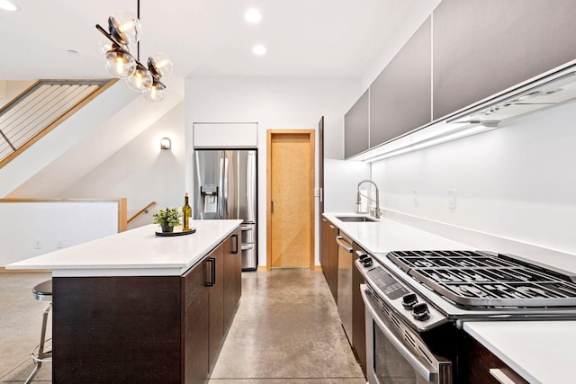 kitchen featuring appliances with stainless steel finishes, modern cabinets, and light countertops