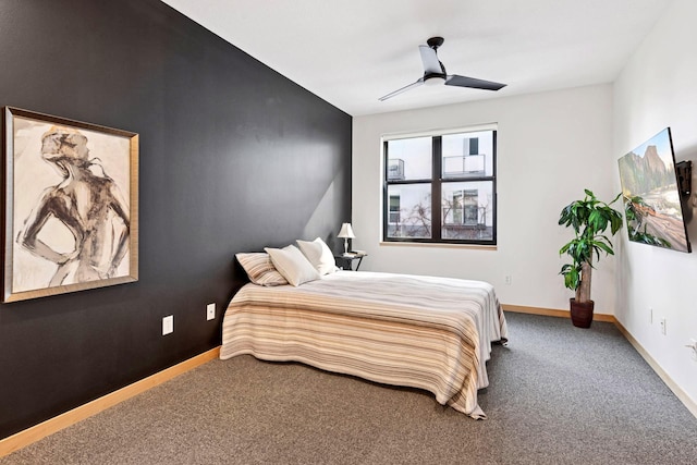 bedroom featuring carpet flooring, ceiling fan, and baseboards