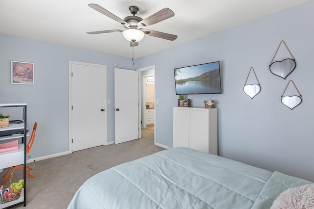 bedroom with carpet floors, a ceiling fan, and baseboards