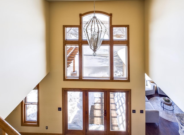 entrance foyer with a notable chandelier