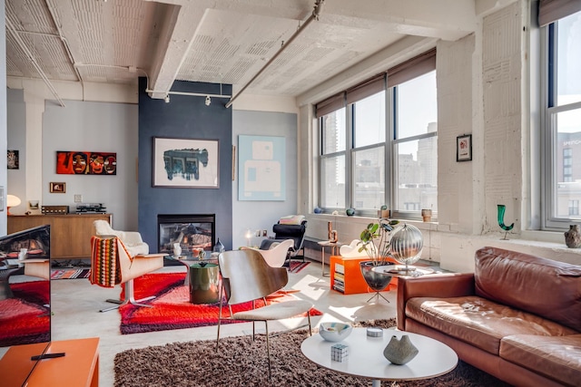 225 9th St E Unit 504, Saint Paul, MN 55101 - living room with a large fireplace and beam ceiling