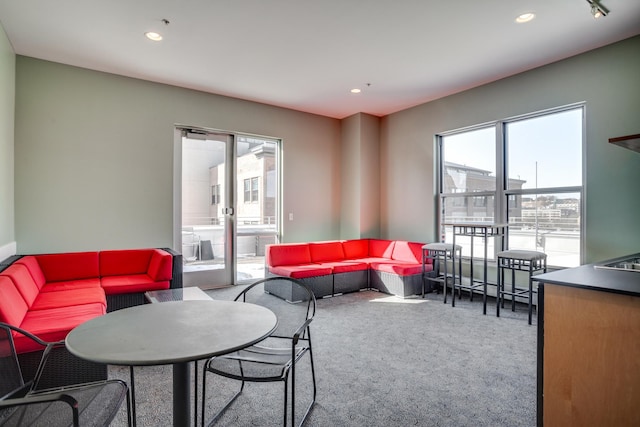 225 9th St E Unit 504, Saint Paul, MN 55101 - carpeted living area with plenty of natural light and recessed lighting