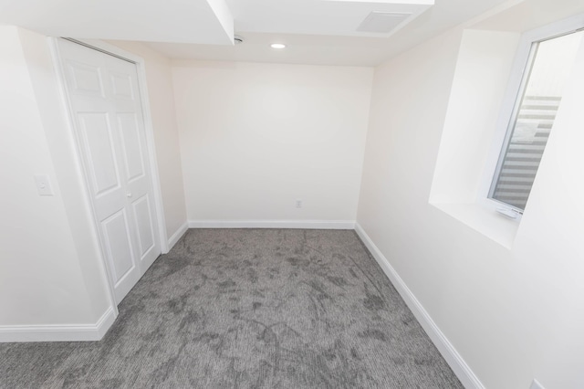 unfurnished room featuring recessed lighting, baseboards, and carpet floors