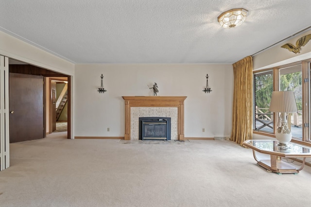 2905 Lake Blvd N, Saint Paul, MN 55109 - unfurnished living room featuring a textured ceiling, light colored carpet, a brick fireplace, stairway, and baseboards