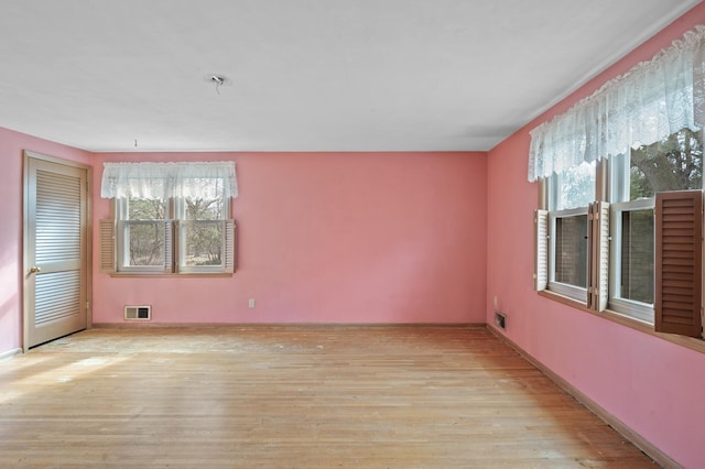 2905 Lake Blvd N, Saint Paul, MN 55109 - spare room featuring wood finished floors and baseboards