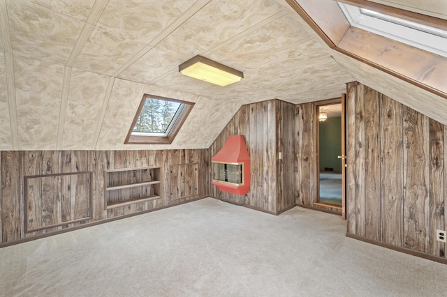 2905 Lake Blvd N, Saint Paul, MN 55109 - bonus room with a skylight, wooden walls, lofted ceiling, built in features, and carpet flooring