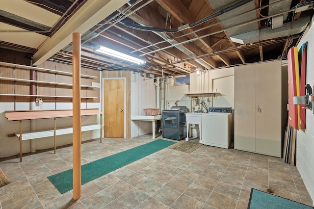 2905 Lake Blvd N, Saint Paul, MN 55109 - unfinished basement featuring washer / clothes dryer, stone finish floors, and a sink