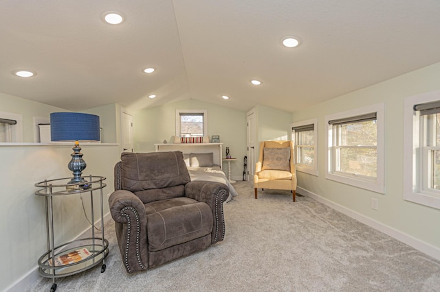 sitting room featuring light carpet, vaulted ceiling, recessed lighting, and baseboards