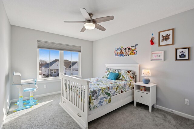 bedroom with baseboards, ceiling fan, and carpet flooring