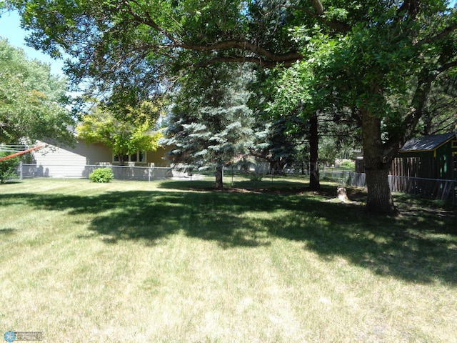 view of yard with fence